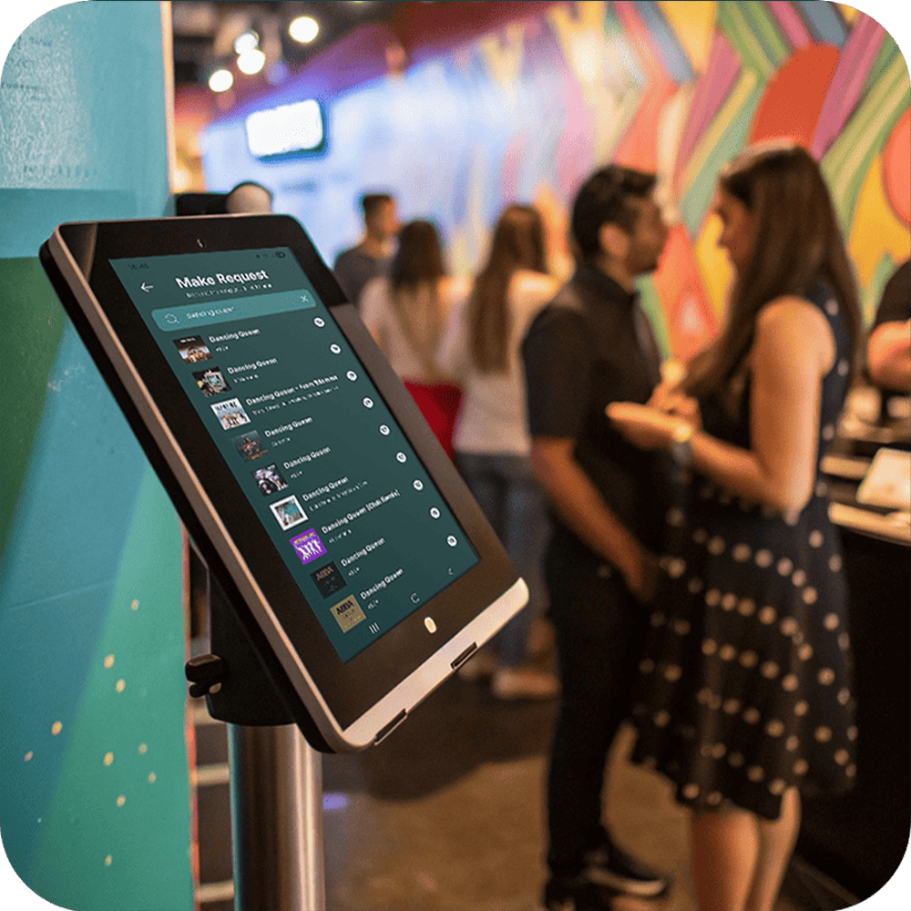 A tablet running Rekwest in kiosk mode at a pub for guests to request songs